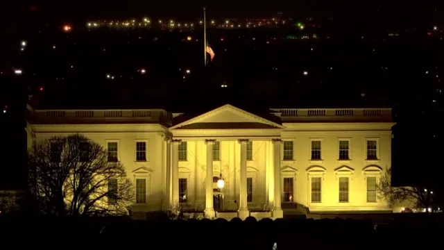 US flag on the White House at half-mast