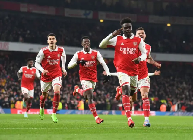 Bukayo Saka celebrates