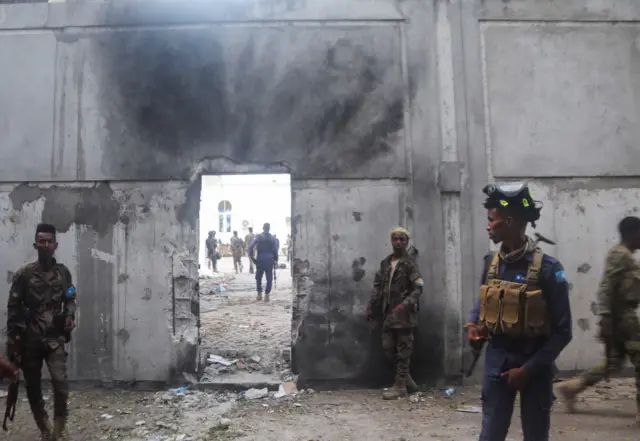 Somali security forces stand outside the mayor's office following a blast in Mogadishu, Somalia January 22, 2023. REUTERS/