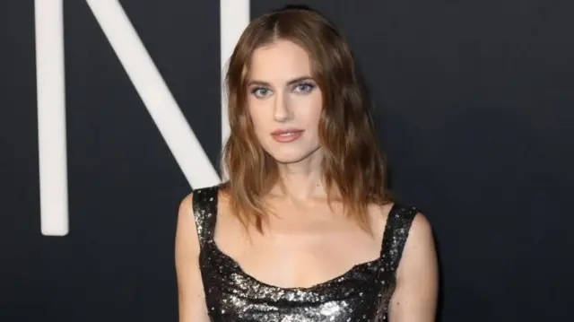 Allison Williams poses on the red carpet prior to the premiere of 'M3GAN' at the TCL Chinese Theater in Los Angeles