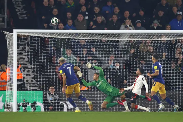 Newcastle's Joelinton shoots over the bar