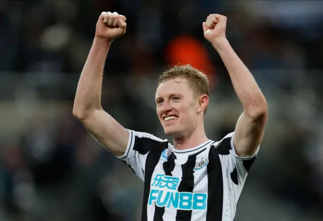 Newcastle's Sean Longstaff celebrates beating Leicester