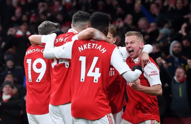 Oleksandr Zinchenko celebrates with his Arsenal team-mates