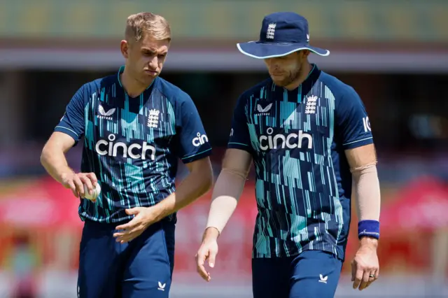 England bowler Olly Stone talks to David Willey