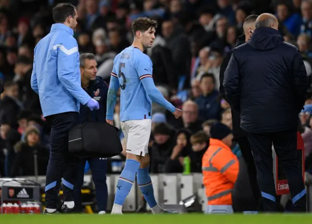 John Stones walks off with physios