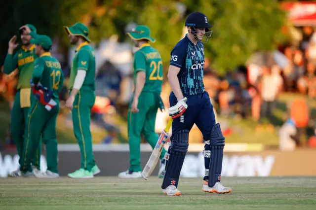 England's Harry Brook walks off after being dismissed in the first ODI against South Africa