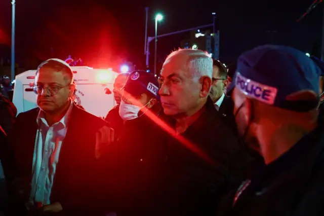 Benjamin Netanyahu and Itamar Ben-Gvir stand alongside Israeli forces at the scene of a shooting in East Jerusalem