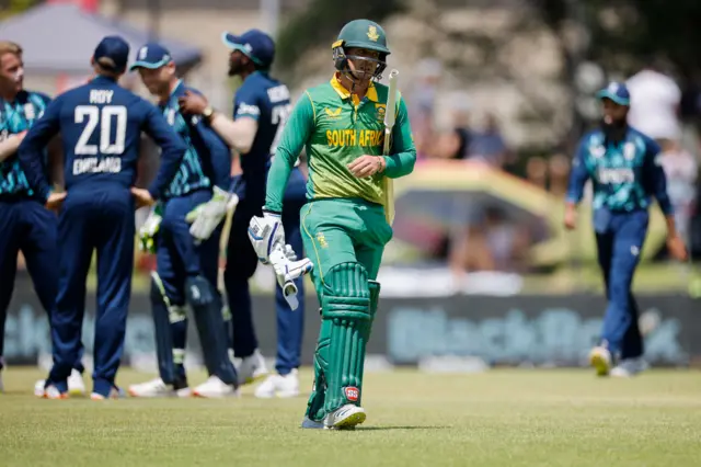 South Africa's Quinton de Kock walks off after being dismissed by England's Sam Curran in the first ODI
