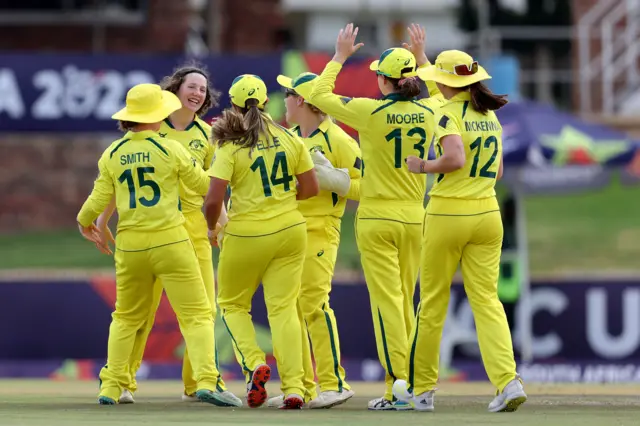 Paris Hall of Australia celebrates with teammates after catching out Niamh Holland of England ( not pictured ) during the ICC Women's U19 T20 World Cup 2023 Semi Final match between England and Australia at JB Marks Oval on January 27, 2023 in Potchefstroom, South Africa.