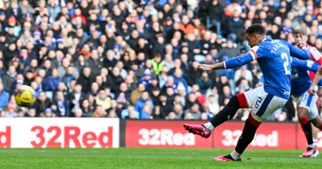 James Tavernier slams the penalty home