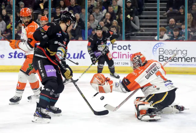 Belfast Giants Henrik Eriksson with Sheffield Steelers Matthew Greenfield