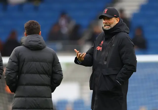 Liverpool manager Jurgen Klopp on the pitch at the Amex Stadium