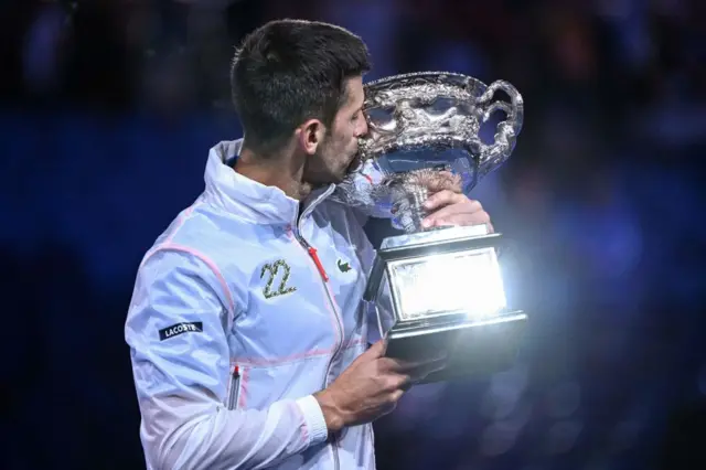 Djokovic kisses the trophy