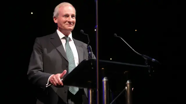 Sir Laurie Magnus speaking at an event