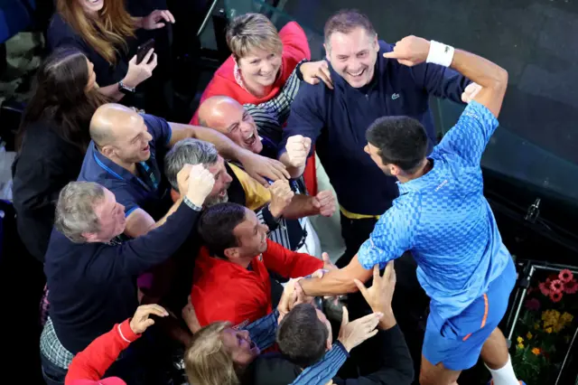 Djokovic with his team