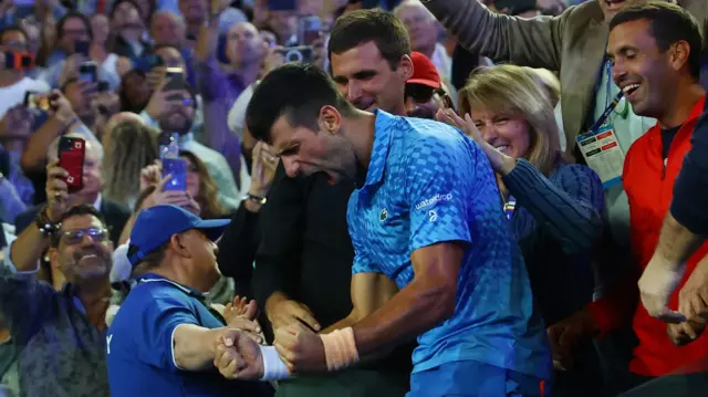 Novak Djokovic celebrates