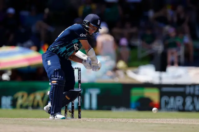 England's Sam Curran hits a second consecutive six from a ball delivered by South Africa's Lungi Ngidi (not seen) during the second one day international (ODI) cricket match between South Africa and England at Mangaung Oval