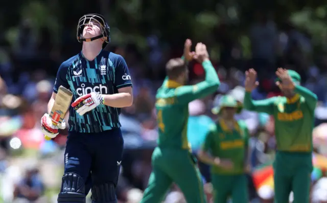 England's Harry Brook reacts after losing his wicket off the bowling of South Africa's Aiden Markram