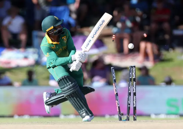 South Africa's Temba Bavuma is bowled out by England's Sam Curran