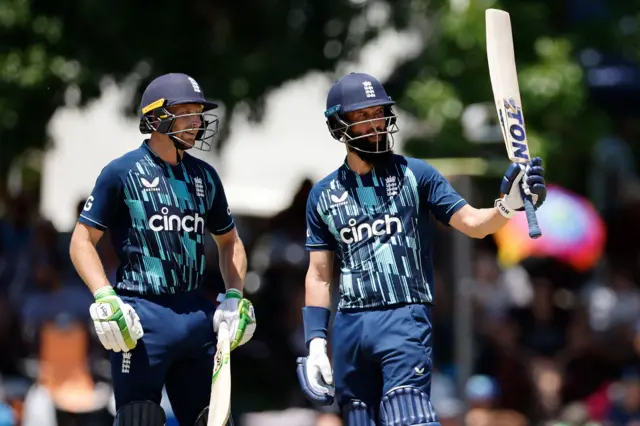 Moeen Ali celebrates hitting a half-century against South Africa in the second ODI