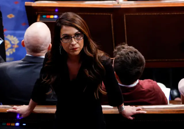 Lauren Boebert stands inside the House Chamber on the first day of the 118th Congress