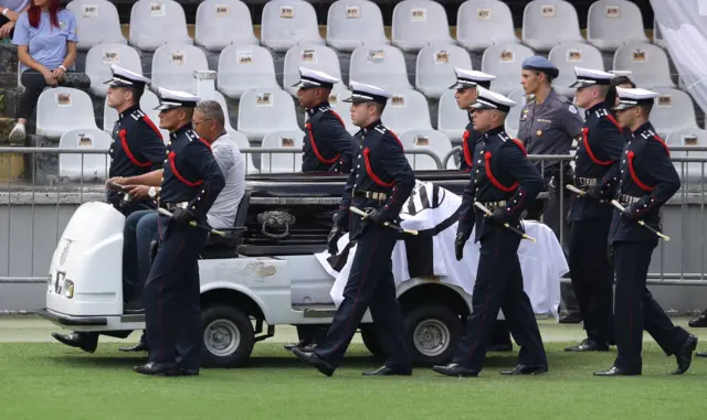 Pele's coffin leaves the Vila Belmiro Stadium