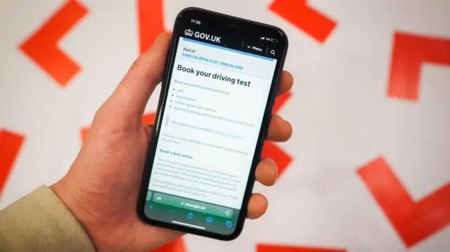 Screen on a mobile phone showing driving test booking form