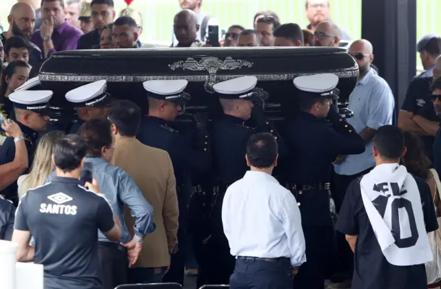 Pele's coffin leaves the Vila Belmiro Stadium