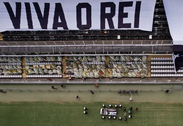 Pele's coffin leaving the stadium