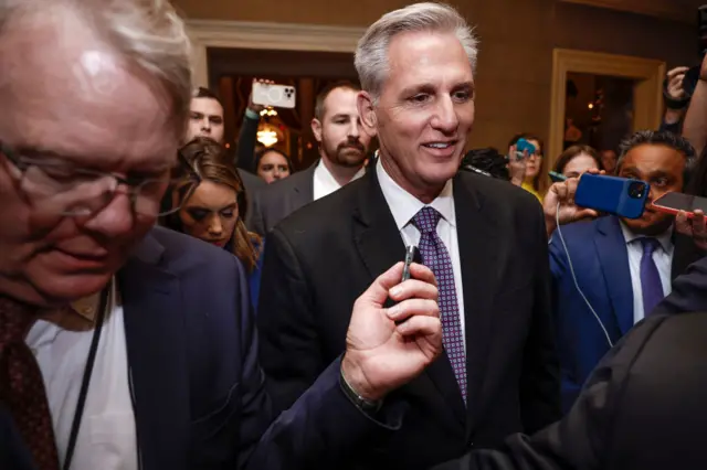 Kevin McCarthy leaves the chamber after losing a sixth vote