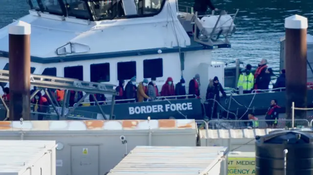 A group of people thought to be migrants are brought in to Dover, Kent, onboard a Border Force vessel,