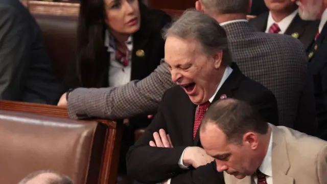 Representative-elect Andy Biggs yawns in the House Chamber during the third day of elections for Speaker of the House at the US Capitol Building on January 05, 2023 in Washington, DC.