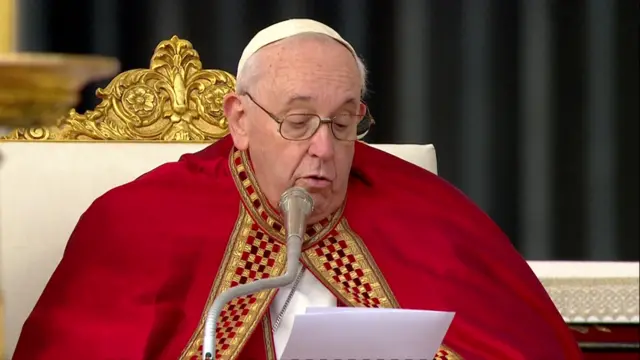 Pope Francis reads the Homily for his predecessor.