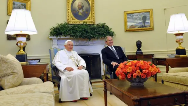 US President George W. Bush welcomes Pope Benedict XVI to the Oval Office of