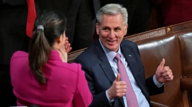 House Republican Leader Kevin McCarthy gives two thumbs up in the direction of Republican Conference Chair Elise Stefanik