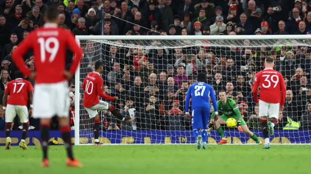 Manchester United's Marcus Rashford scores their third goal against Everton from the penalty spot