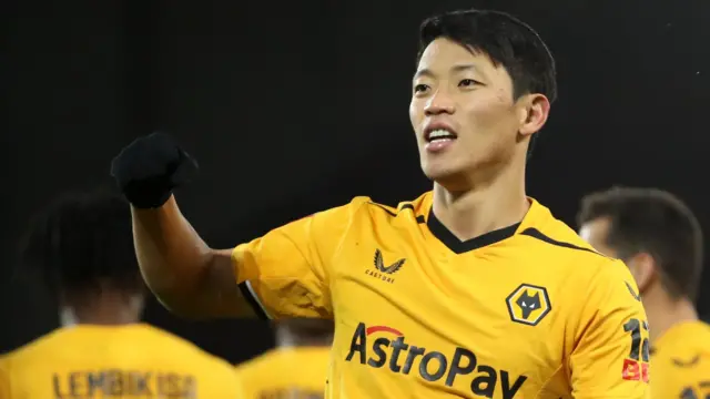 Hwang Hee-chan of Wolverhampton Wanderers celebrates after scoring the team's second goal during the Emirates FA Cup Third Round match between Liverpool FC and Wolverhampton Wanderers