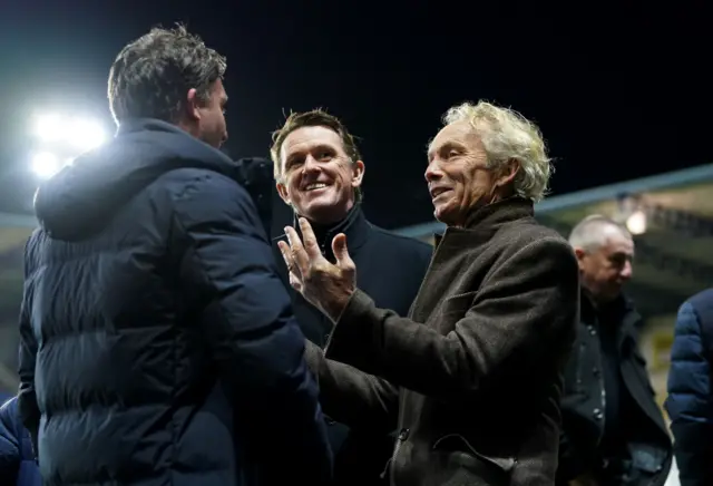 Retired jockeys AP McCoy (centre) and John Francome (right) pitchside before the Emirates FA Cup third round match between Oxford United and Arsenal at the Kassam Stadium, Oxford.