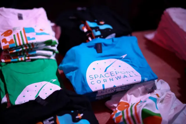 Spaceport Cornwall merchandise for sale during a spectator event for Virgin Orbit's LauncherOne first UK launch at Cornwall Airport Newquay in Newquay, Britain, January 9, 2023.