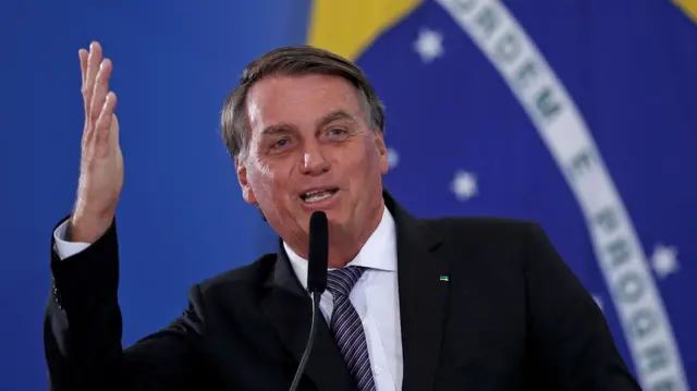 Jair Bolsonaro speaks at a ceremony, April 2022