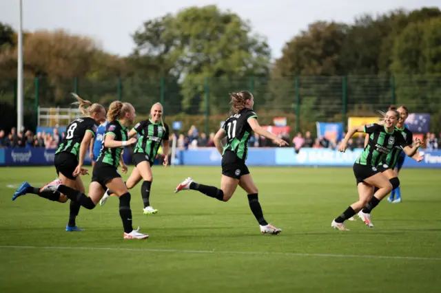 Terland wheels away to celebrate her second for Brighton.