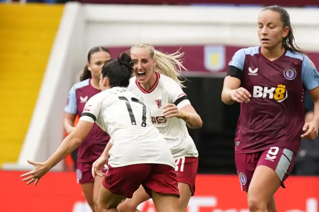 Garcia and Turner scream in delight after the former's equaliser.