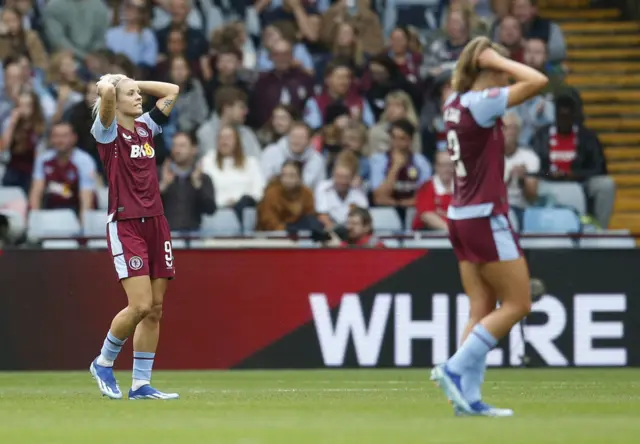 Daly puts her hands to her head after nearly opening the scoring.