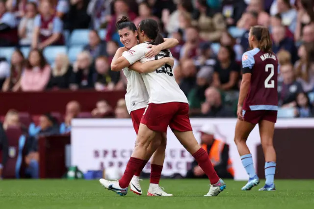 Rachel Williams celebrates with Garcia.