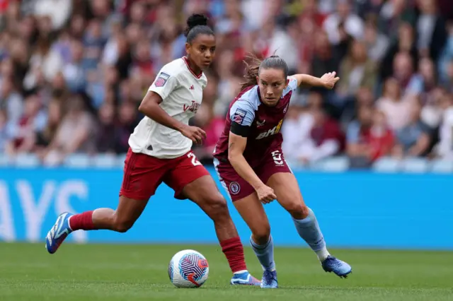 Geyse dribbles away from a Villa defender.