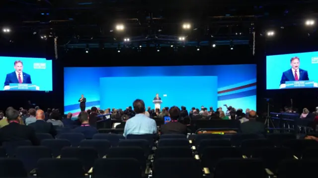 Grant Shapps addressing the Conservative Party Conference