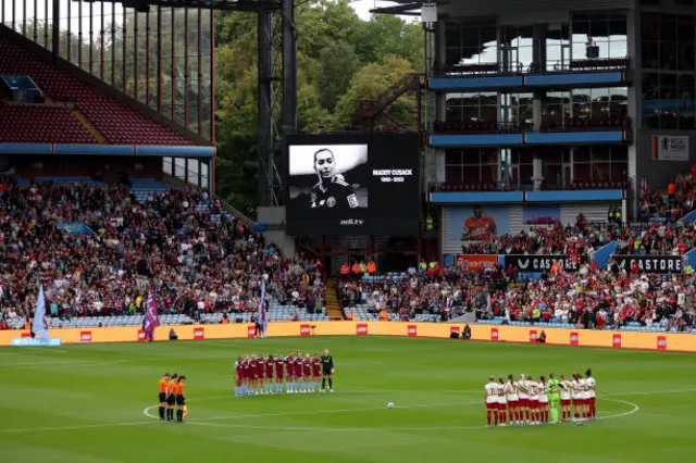 Players line up for minute's silence