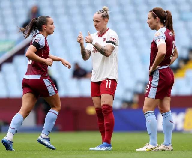 Galton signals thumbs up to the bench as she gets back to her feet.