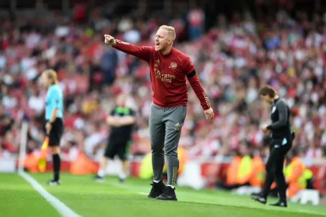 Eidevall shouts and points instructions from his technical area.