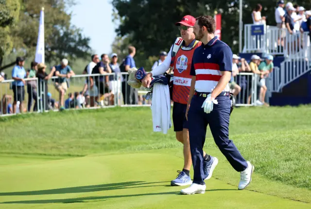 Patrick Cantlay and his caddie, Joe LaCava